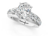 Silver Oval Brilliant Solitaire with Side Stones on a Pave Band and Four-Prong Setting_15