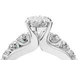 Silver Oval Brilliant Solitaire with Side Stones on a Pave Band and Four-Prong Setting_18