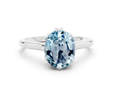 Silver Oval Cut Aquamarine Solitaire Ring with Flower Prong Setting and Classic Band