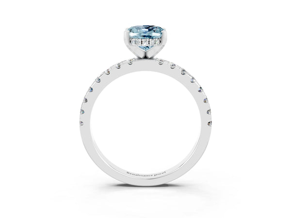 Silver Oval Cut Aquamarine Solitaire Ring with Round Pavé Band and Four-Prong Setting