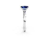 Silver Oval Cut Blue Sapphire Engagement Ring with Side Stone Accents and Four-Prong Setting_14
