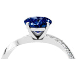 Silver Oval Cut Blue Sapphire Engagement Ring with Side Stone Accents and Four-Prong Setting_16