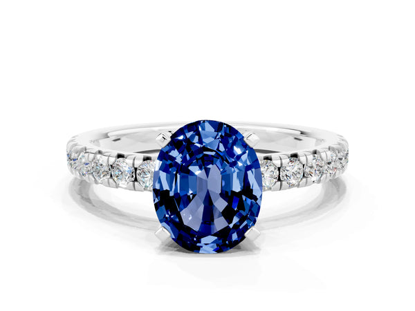 Silver Oval Cut Blue Sapphire Solitaire Pavé Engagement Ring with Round Band and Prong Setting
