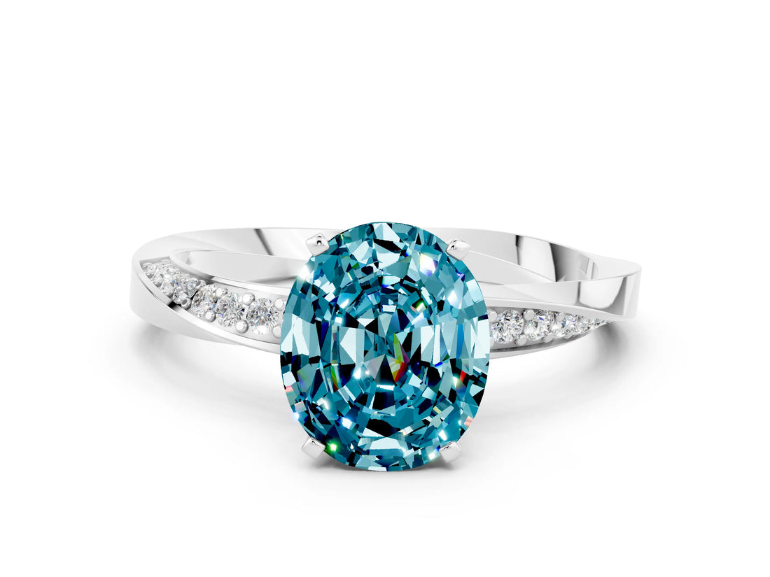 Silver Oval Cut Blue Topaz Engagement Ring with Side Stone Accents and Four-Prong Setting_12