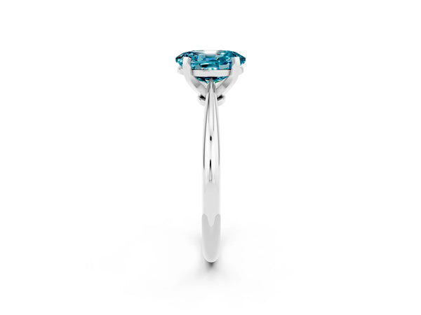 Silver Oval Cut Blue Topaz Solitaire Engagement Ring with Classic Band and Four-Prong Setting