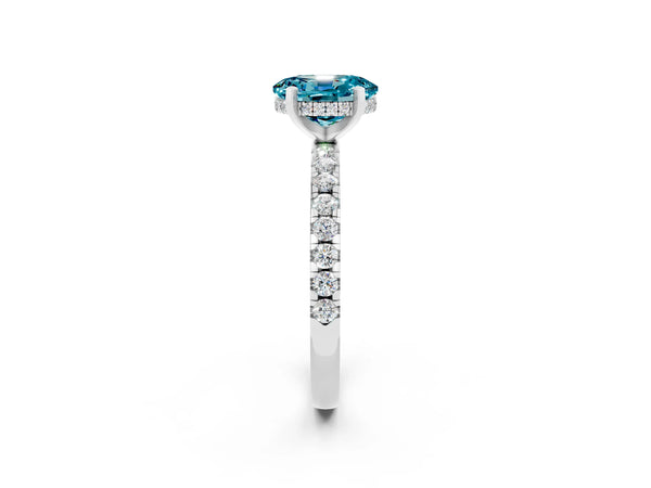 Silver Oval Cut Blue Topaz Solitaire Ring with Round Pavé Band and Four-Prong Setting