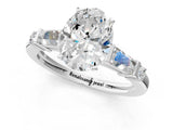 Silver Oval Cut Diamond Ring with Baguette Side Stones, Channel Set Band, and Four-Prong Setting_22