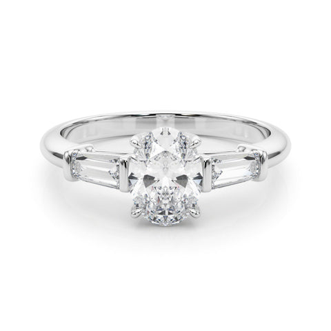 Silver Oval Cut Diamond Ring with Tapered Baguette Side Stones on a Platinum Band with Four-Prong Setting 2