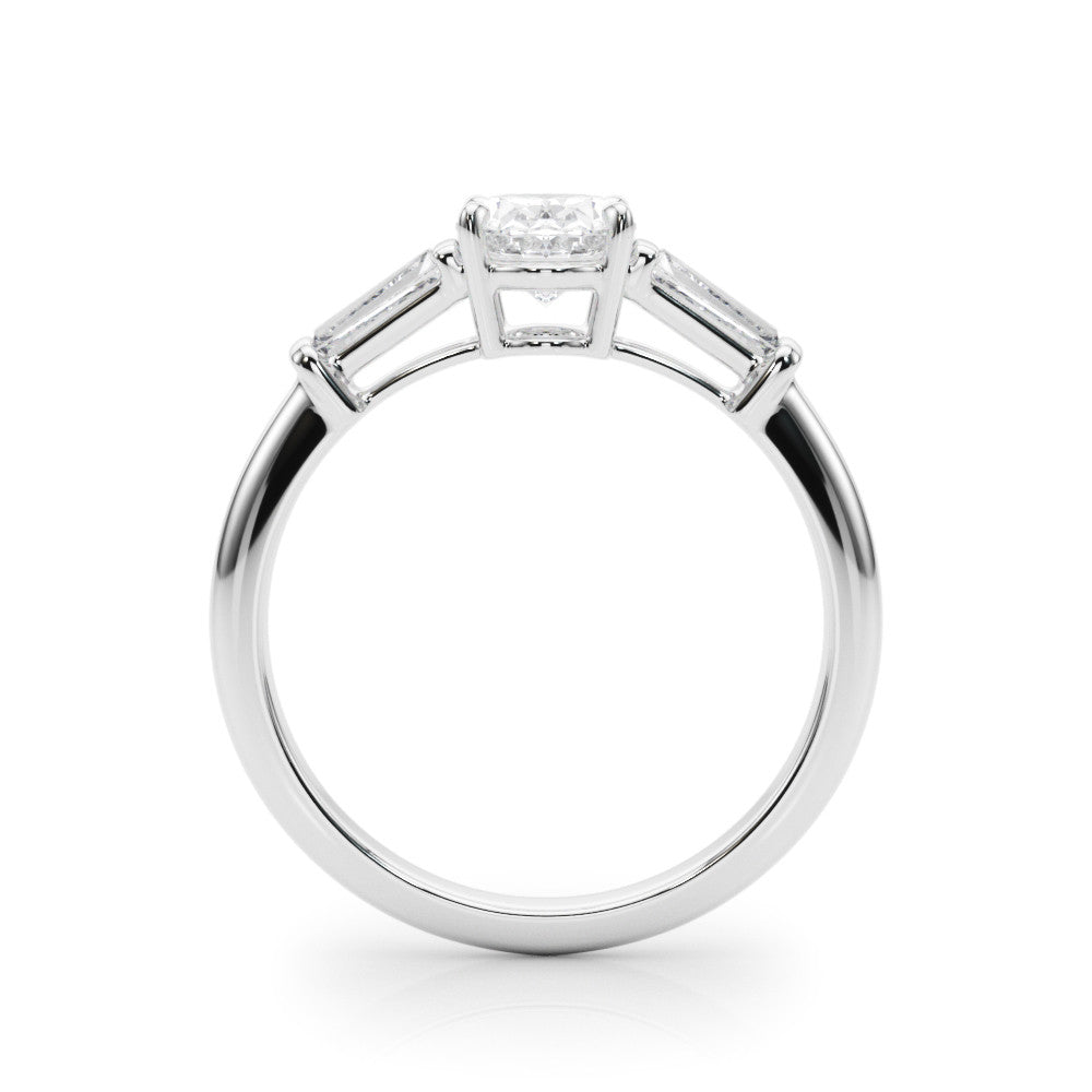 Silver Oval Cut Diamond Ring with Tapered Baguette Side Stones on a Platinum Band with Four-Prong Setting