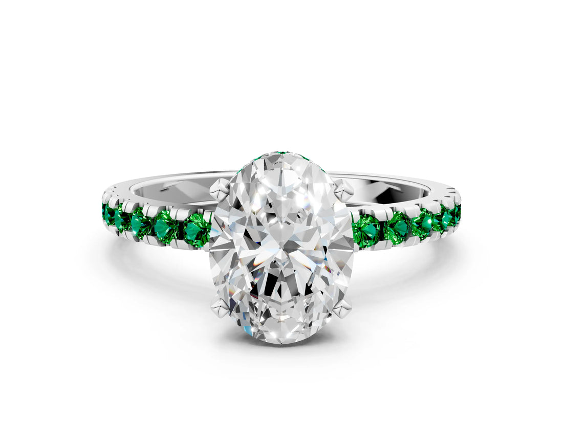 Silver Oval Cut Diamond Solitaire Ring with Round with Emerald side stone Pavé Band and Four-Prong Setting_12