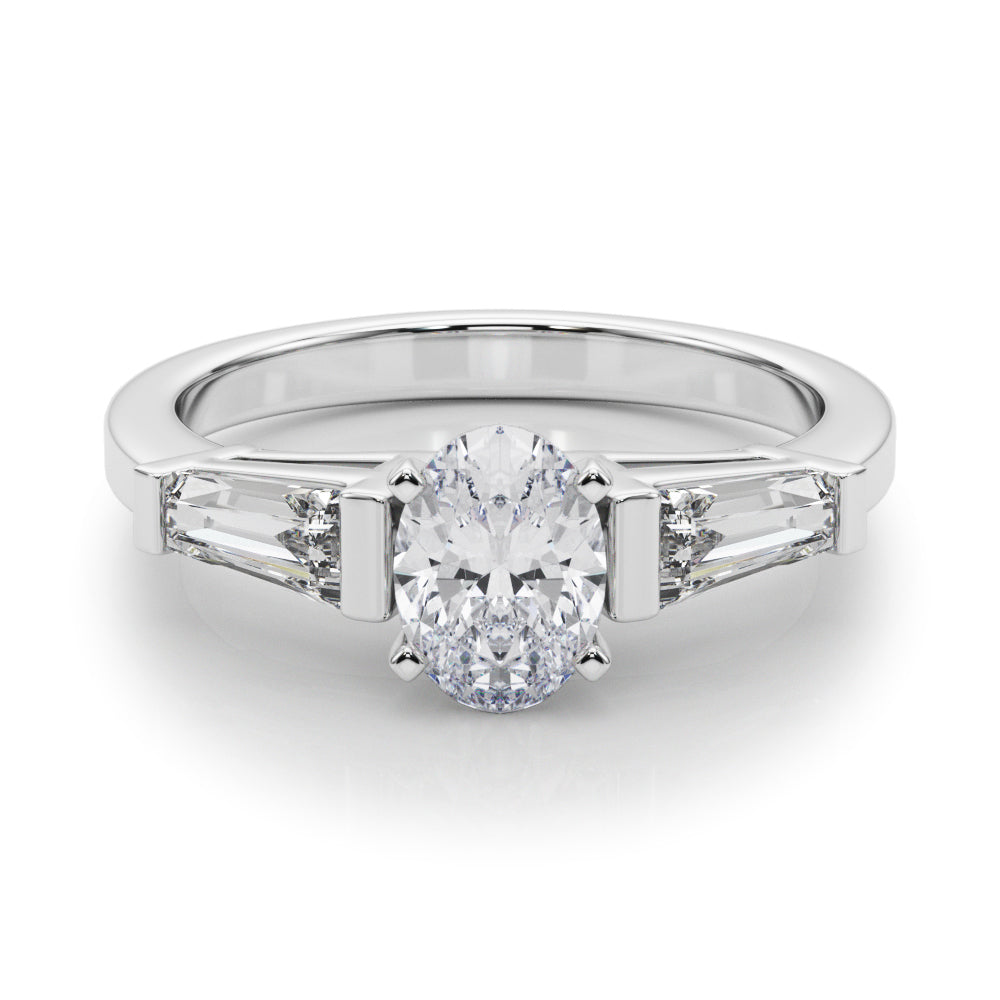 Silver Oval Cut Diamond Solitaire Ring with Tapered Baguette Accents and Four-Prong Setting