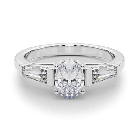 Silver Oval Cut Diamond Solitaire Ring with Tapered Baguette Accents and Four-Prong Setting