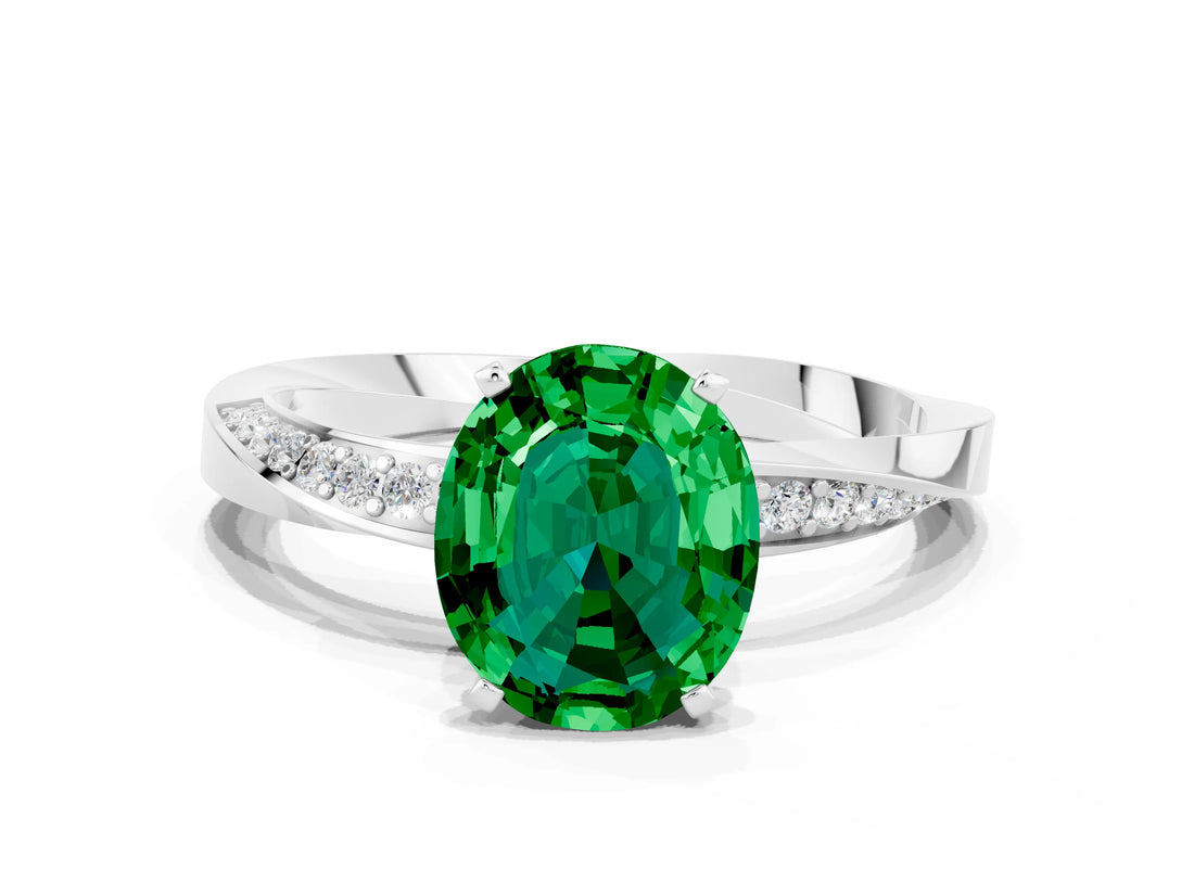 Silver Oval Cut Emerald Engagement Ring with Side Stone Accents and Four-Prong Setting_24