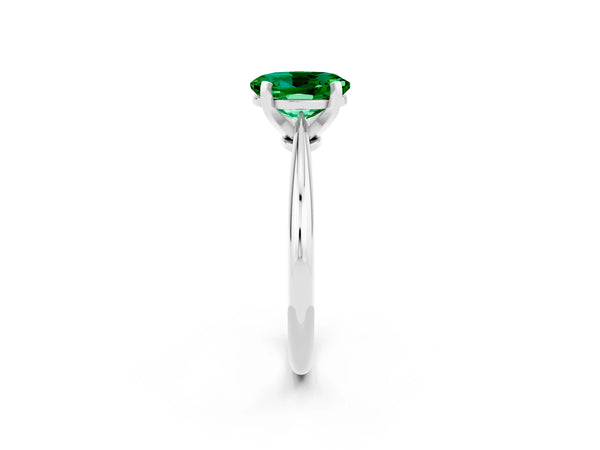 Silver Oval Cut Emerald Solitaire Engagement Ring with Classic Band and Four-Prong Setting