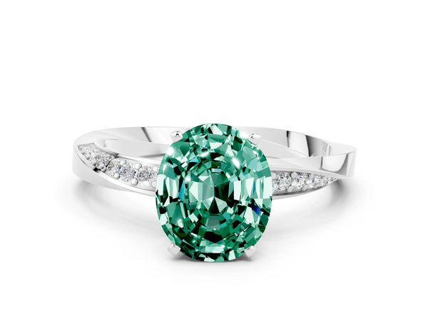 Silver Oval Cut Green Sapphire Engagement Ring with Side Stone Accents and Four-Prong Setting
