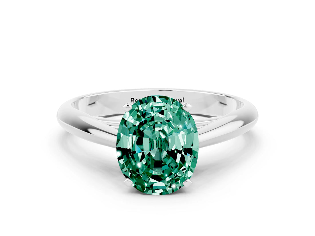 Silver Oval Cut Green Sapphire Solitaire Engagement Ring with Cathedral Setting and Four-Prong Mount