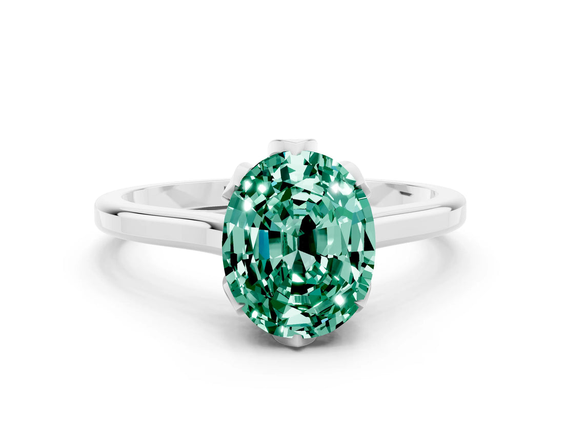 Silver Oval Cut Green Sapphire Solitaire Ring with Flower Prong Setting and Classic Band