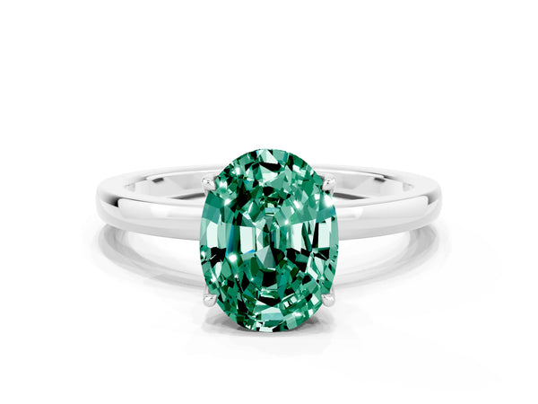 Silver Oval Cut Green Sapphire Solitaire Ring with Thin Band and Prong Setting