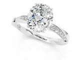 Silver Oval Cut Moissanite Engagement Ring with Side Stone Accents and Four-Prong Setting_13