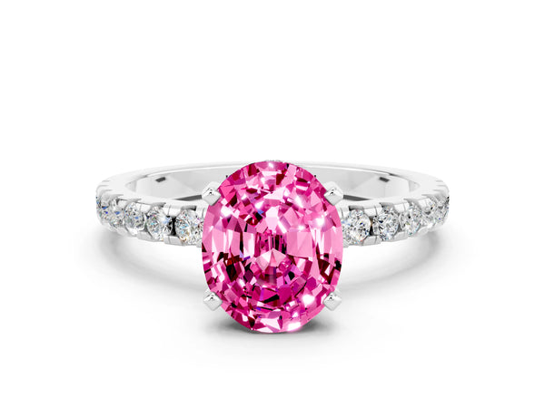 Silver Oval Cut Pink Sapphire Solitaire Ring with Round Pavé Band and Four-Prong Setting