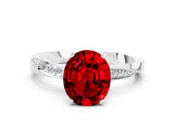 Silver Oval Cut Ruby Engagement Ring with Side Stone Accents and Four-Prong Setting_24
