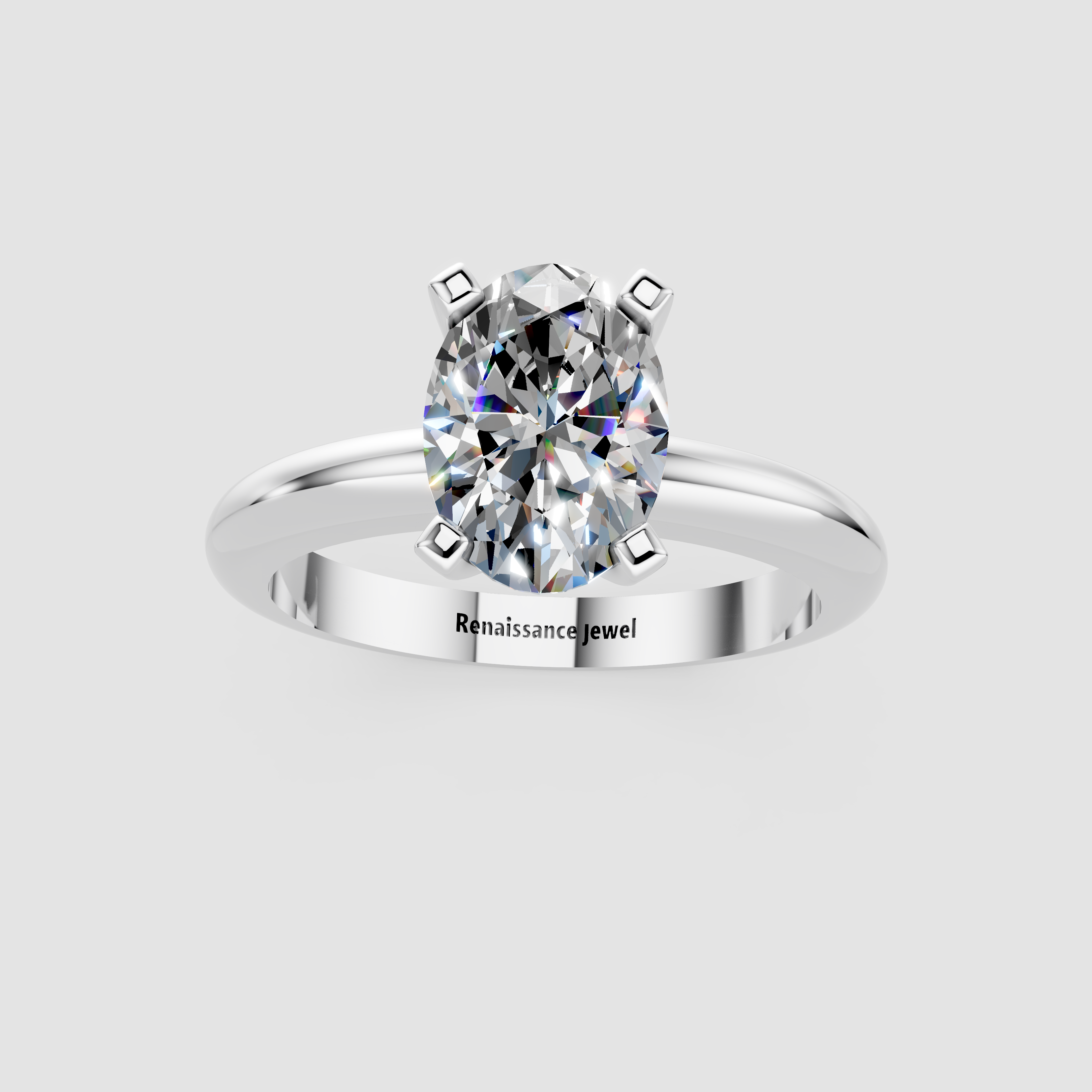 Silver Oval Cut Solitaire Engagement Ring with Round Band and Four-Prong Setting 1