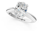 Silver Oval Cut Solitaire Engagement Ring with Tapered Band and Four-Prong Setting 1