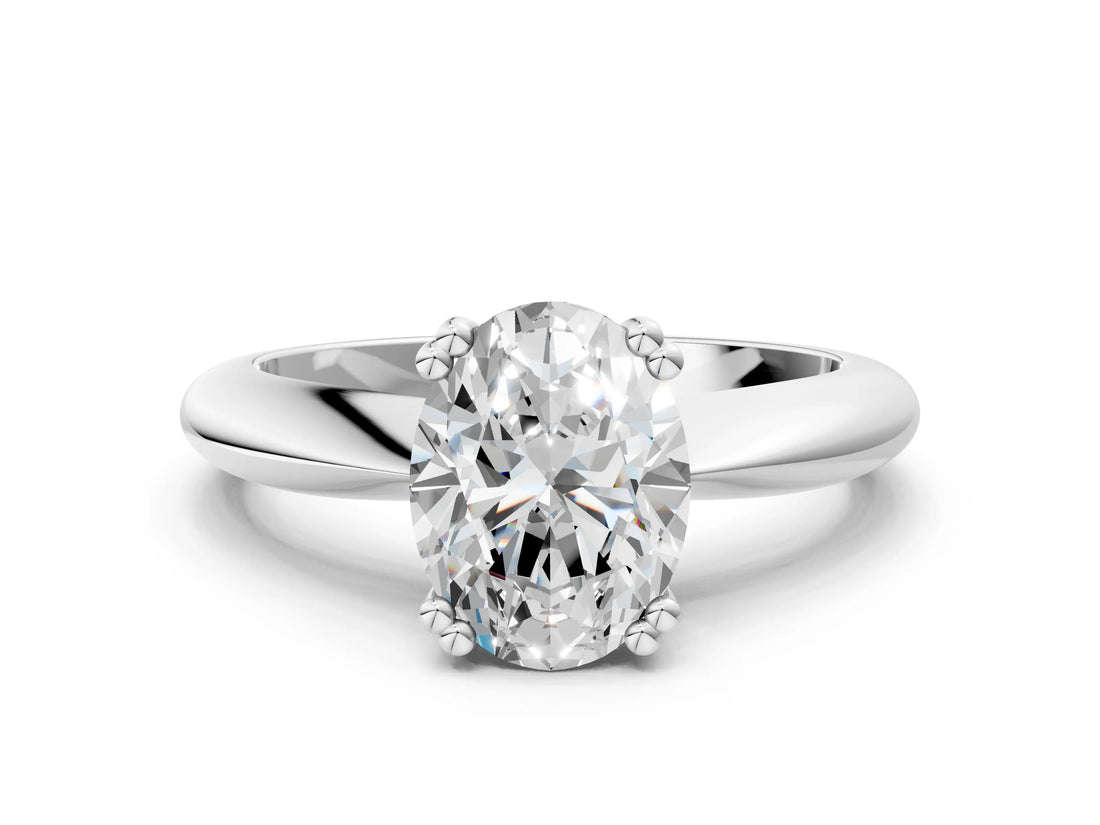 Silver Oval Cut Solitaire Engagement Ring with Tapered Band and Four-Prong Setting