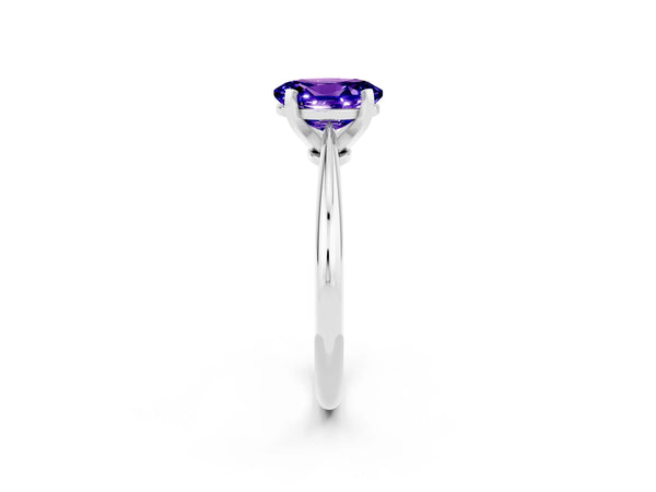 Silver Oval Cut Tanzanite Solitaire Engagement Ring with Classic Band and Four-Prong Setting