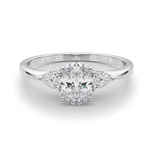 White gold Oval Cut Three-Stone Diamond Ring with Pear Side Stones on a Classic Solitaire Band with Prong Setting