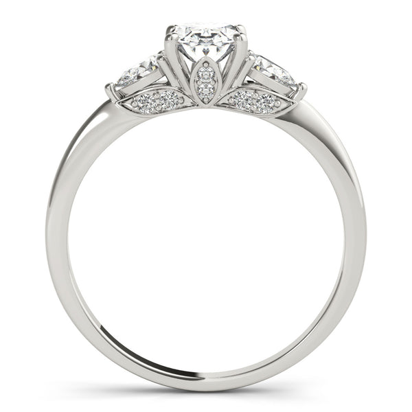 White gold Oval Cut Three-Stone Diamond Ring with Pear Side Stones on a Classic Solitaire Band with Prong Setting