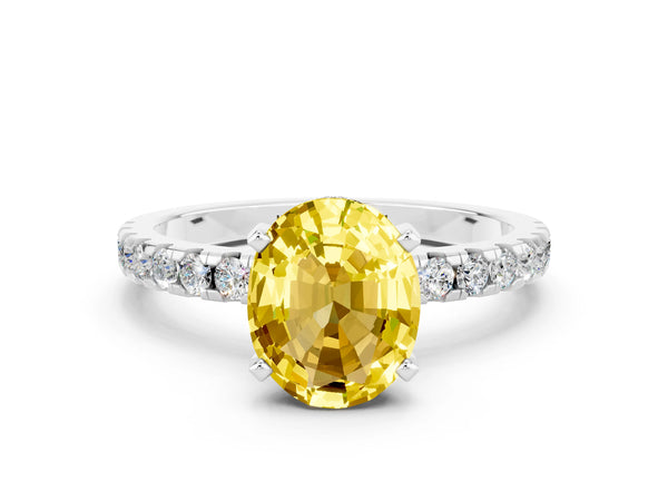 Silver Oval Cut Yellow Sapphire Solitaire Ring with Round Pavé Band and Four-Prong Setting