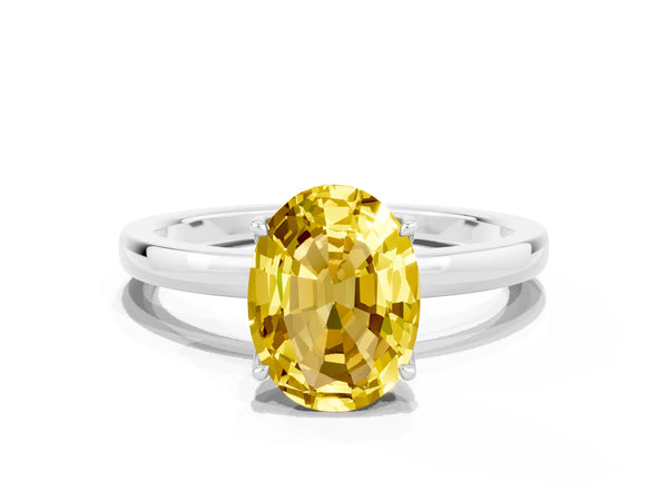 Silver Oval Cut Yellow Sapphire Solitaire Ring with Thin Band and Prong Setting