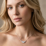 Silver Oval Diamond Pendant with Heart Accents and Prong Setting_13