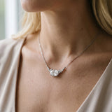 Silver Oval Diamond Pendant with Heart Accents and Prong Setting_14
