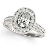 Silver Oval Halo Diamond Engagement Ring with Pave Band and Four-Prong Setting