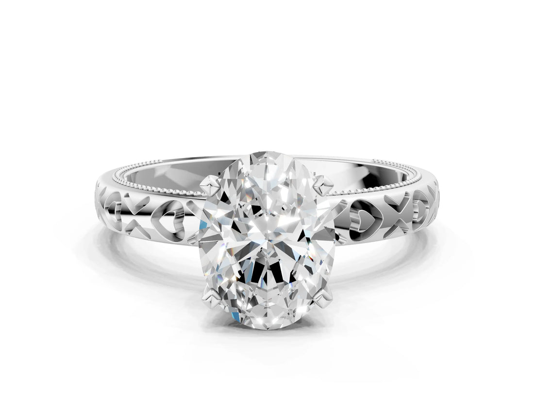 Silver Oval Solitaire Diamond Engagement Ring with XO Engraved Band and Four-Prong Setting
