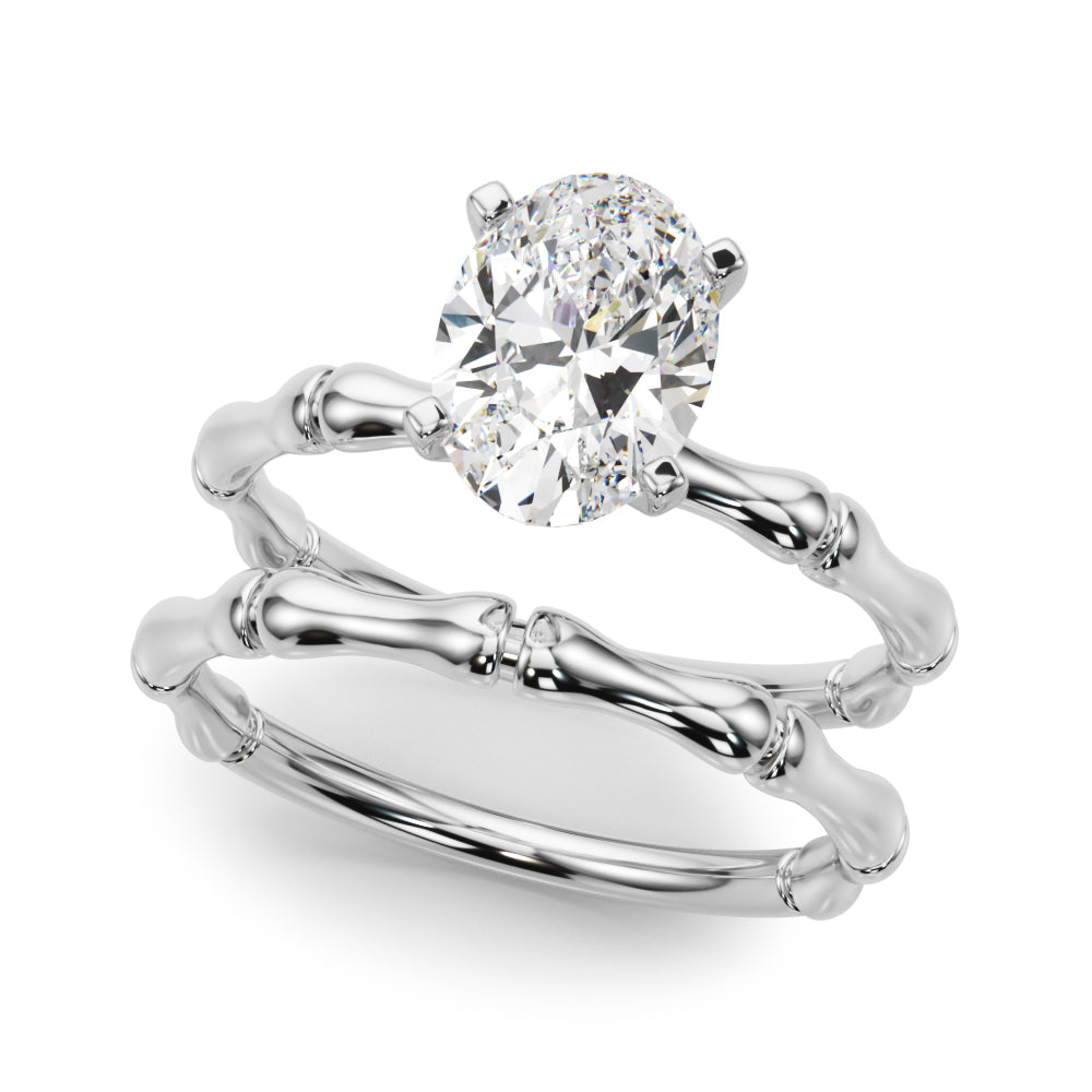 Silver Oval Solitaire Diamond Ring with Bamboo Band and Four-Prong Setting