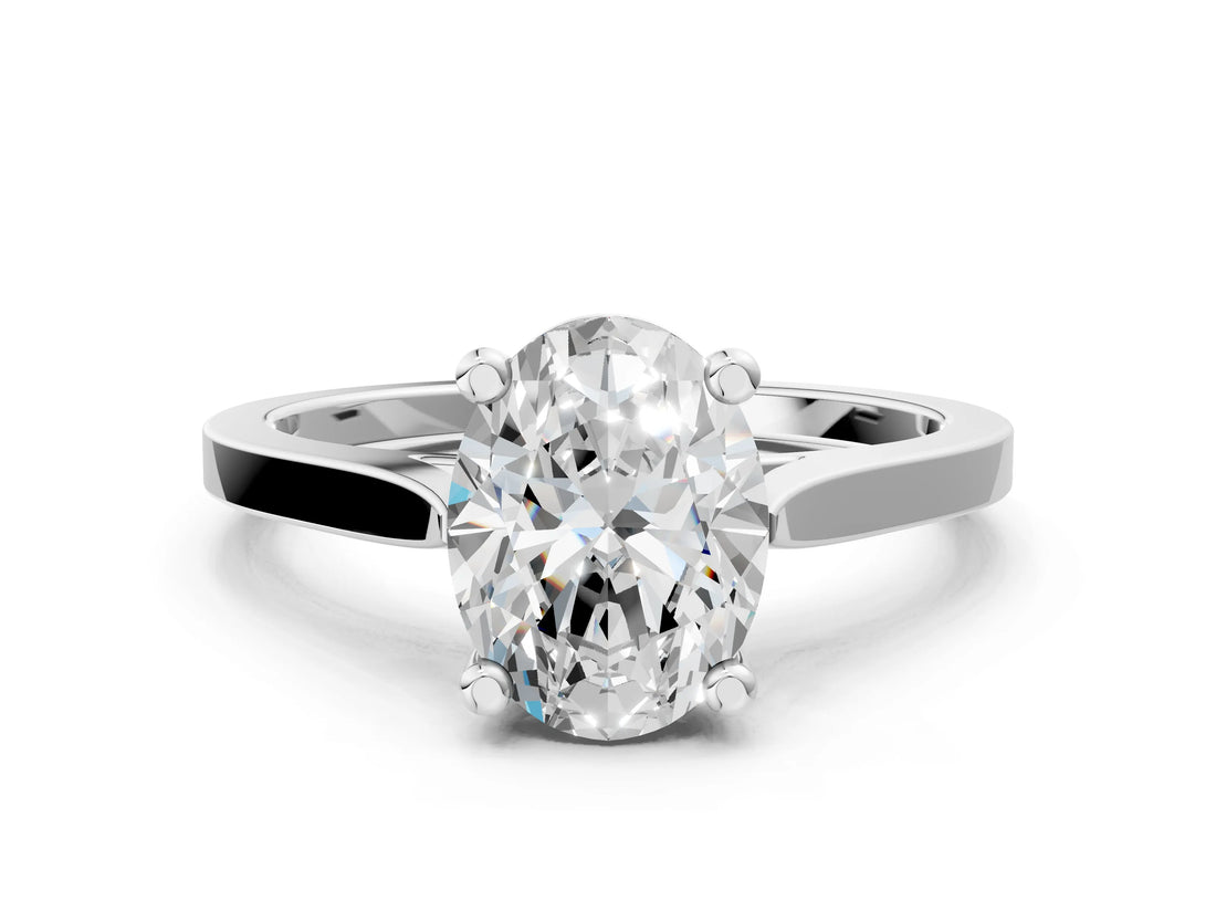 Silver Oval Solitaire Diamond Ring with Four-Prong Setting and Tapered Band