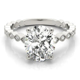 Silver Oval Solitaire Diamond Ring with Infinity Twist Band and Four-Prong Setting 1