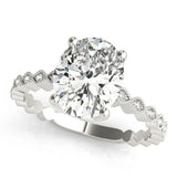 Silver Oval Solitaire Diamond Ring with Infinity Twist Band and Four-Prong Setting