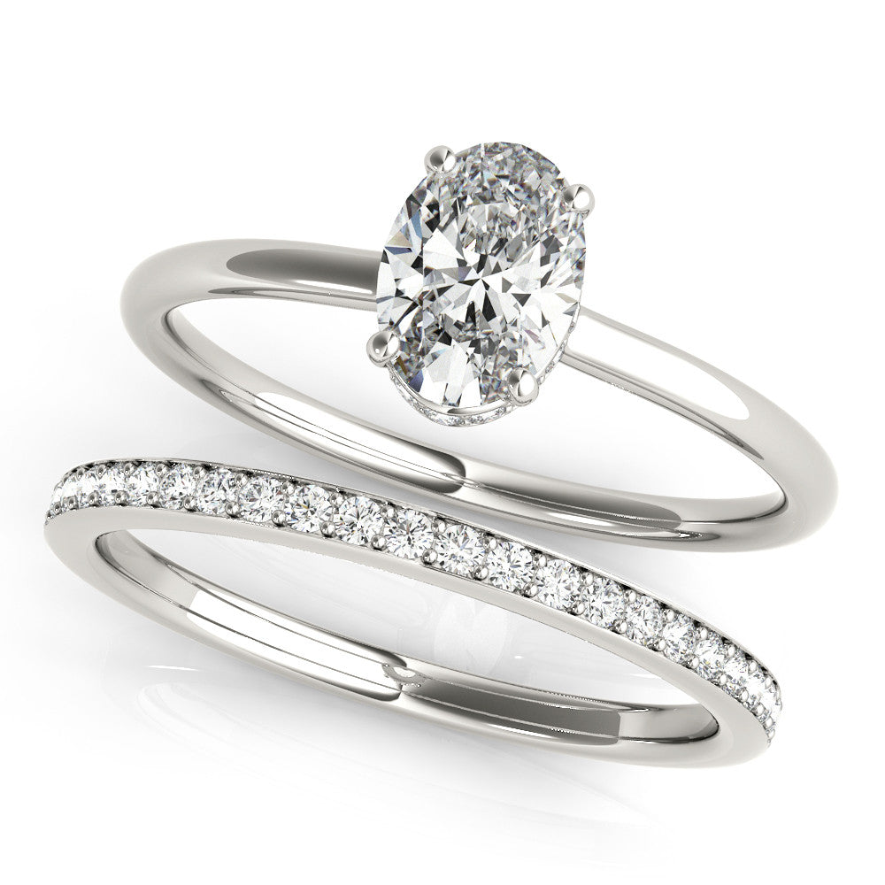 Silver Oval Solitaire Diamond Ring with Thin Band and Four-Prong Setting