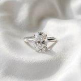 Silver Oval Solitaire Engagement Ring with Cathedral Band and Four-Prong Setting_70