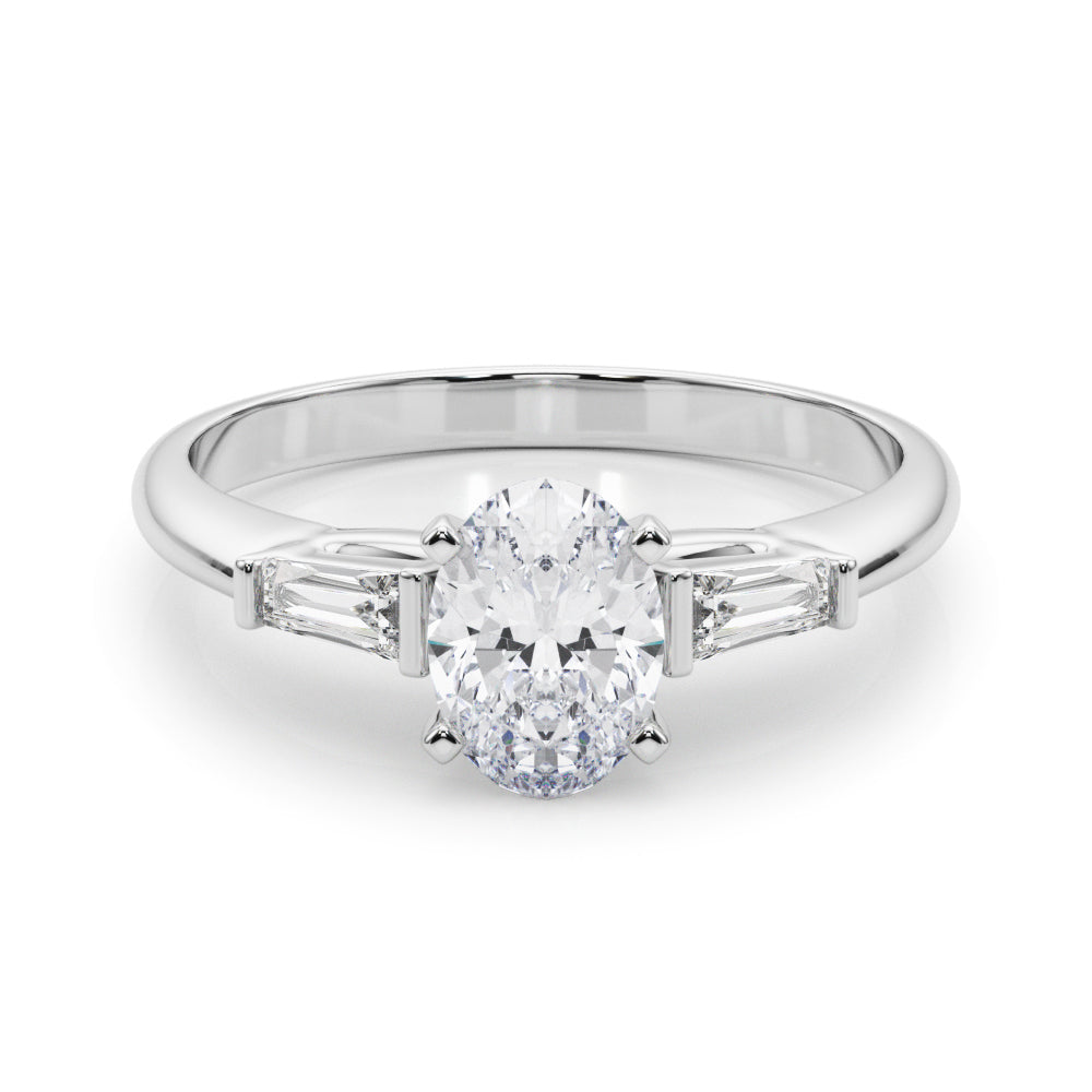 Silver Oval Solitaire with Tapered Baguette Side Stones on a Classic Band with Four-Prong Setting