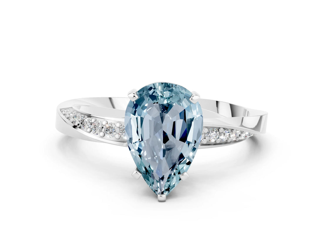 Silver Pear Cut Aquamarine Engagement Ring with Side Stone Accents and Four-Prong Setting_24