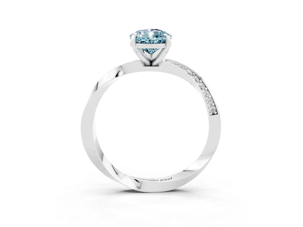 Silver Pear Cut Aquamarine Engagement Ring with Side Stone Accents and Four-Prong Setting