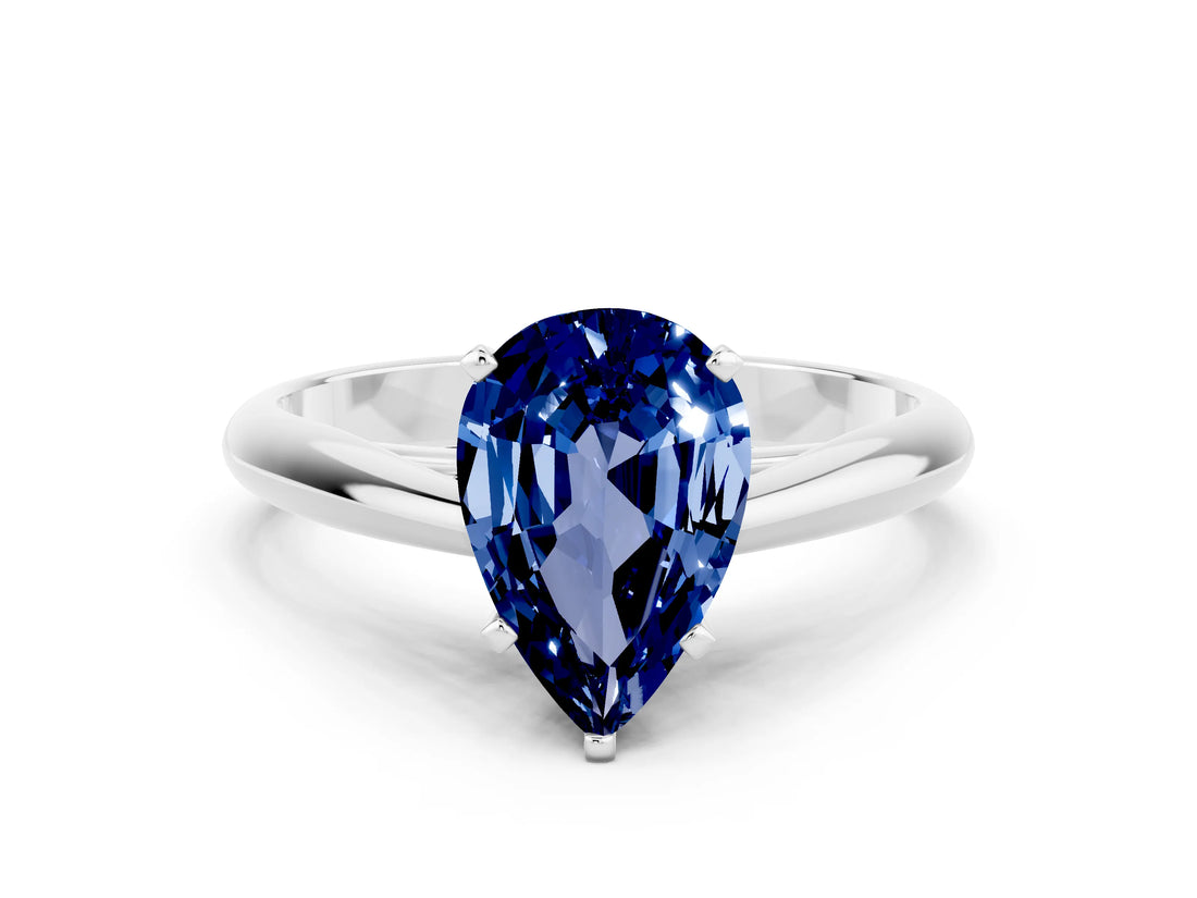 Silver Pear Cut Blue Sapphire Solitaire Engagement Ring with Cathedral Setting and Four-Prong Mount_24