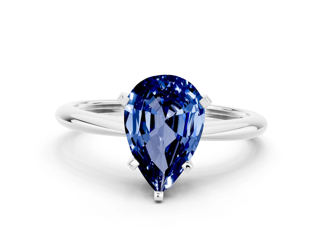 Silver Pear Cut Blue Sapphire Solitaire Engagement Ring with Classic Band and Four-Prong Setting_24