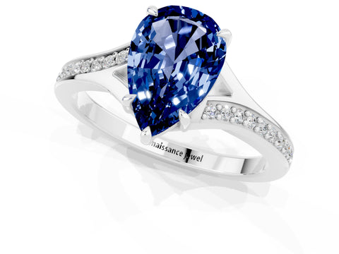 Silver Pear Cut Blue Sapphire Solitaire Ring with Pavé Band and Prong Setting_13