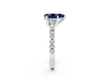 Silver Pear Cut Blue Sapphire Solitaire Ring with Round  Pavé Band and Four-Prong Setting_38